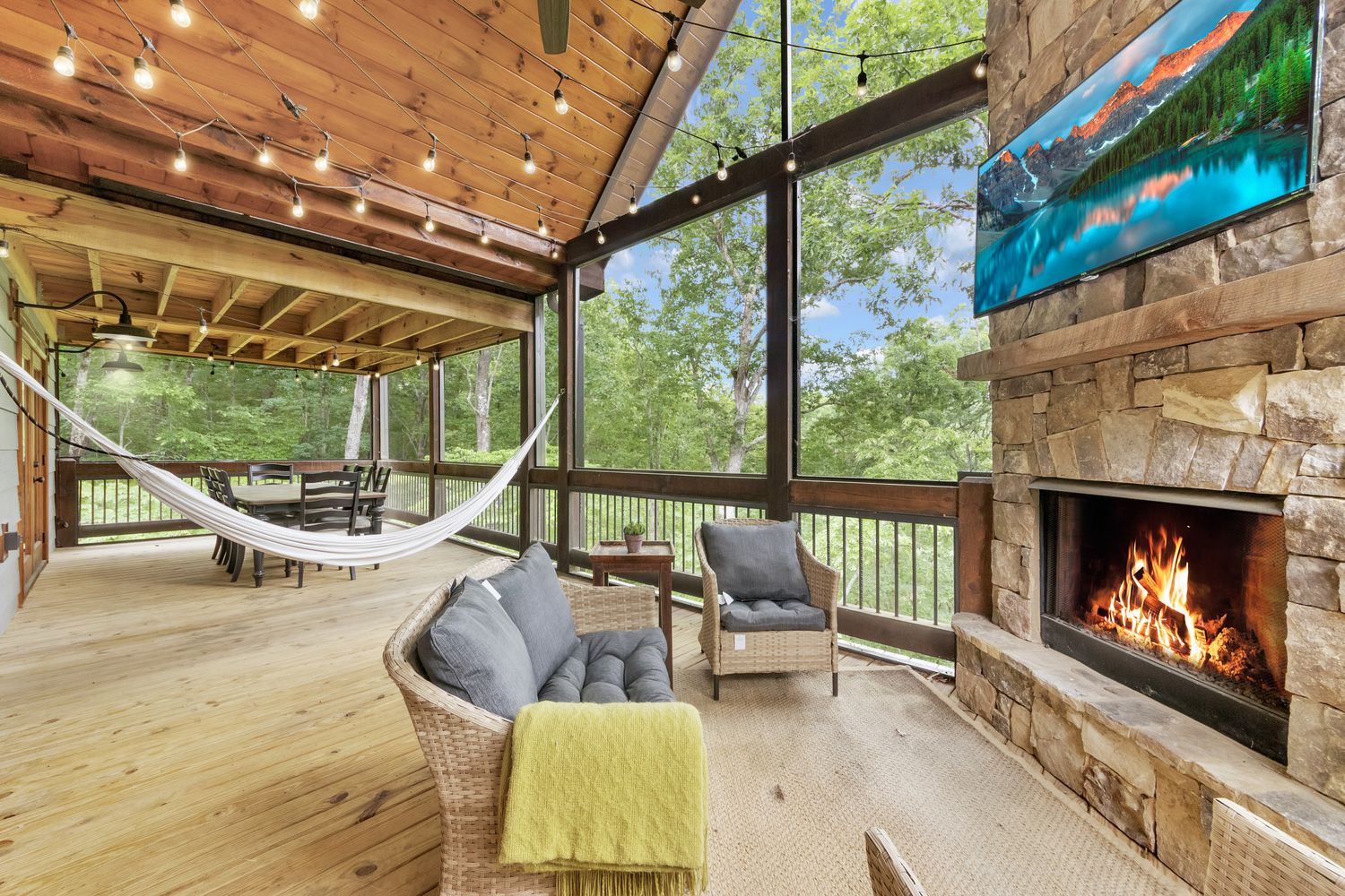 Covered deck, outdoor fireplace & hammock