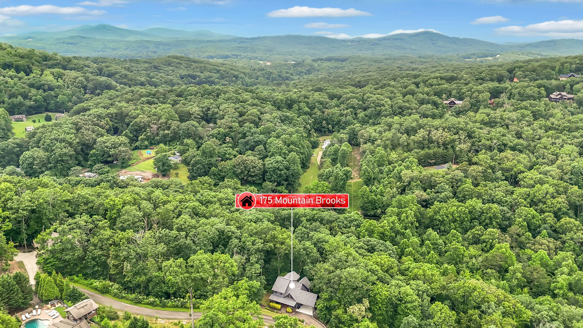 Aerial view of 175 Mountain Brooks with layered Blue Ridge mountains beyond