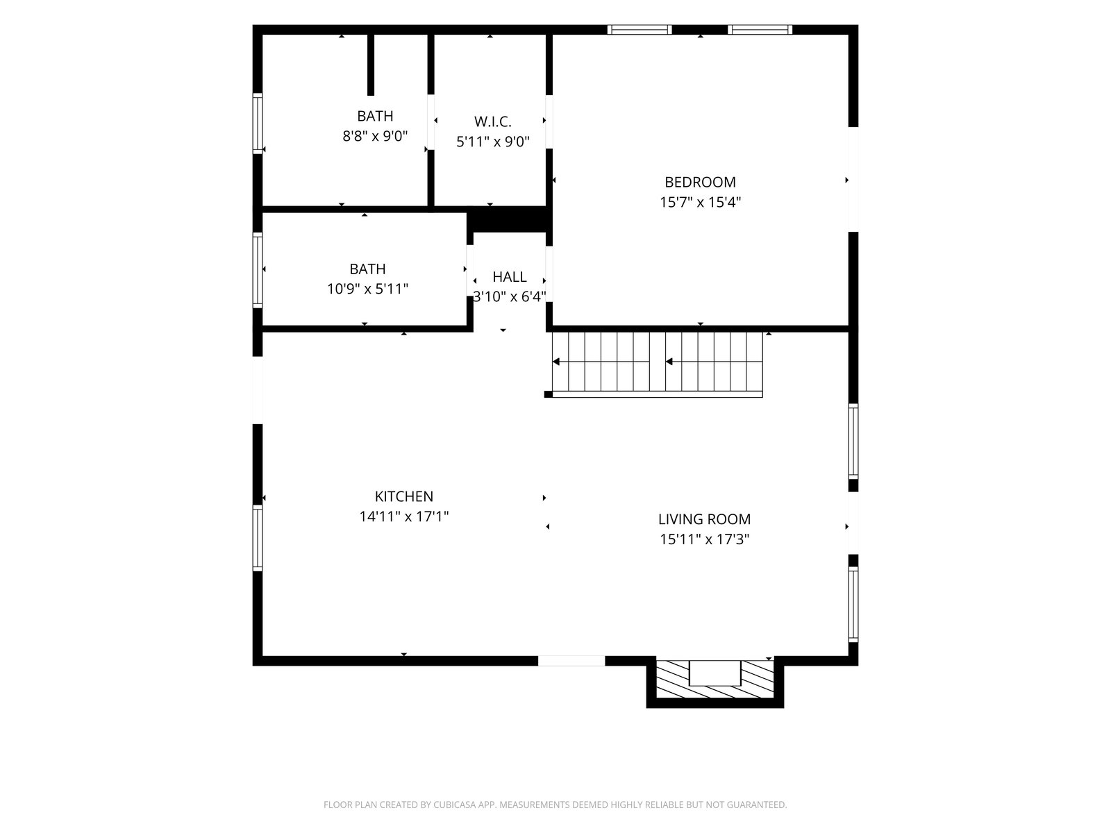 Main level floor plan — kitchen, living room, primary bedroom, two baths